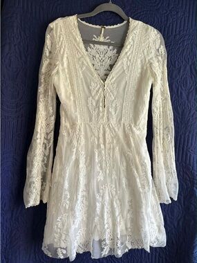 Free People “Reign over me” Ivory Lace Long bell Sleeve Dress *RARE*